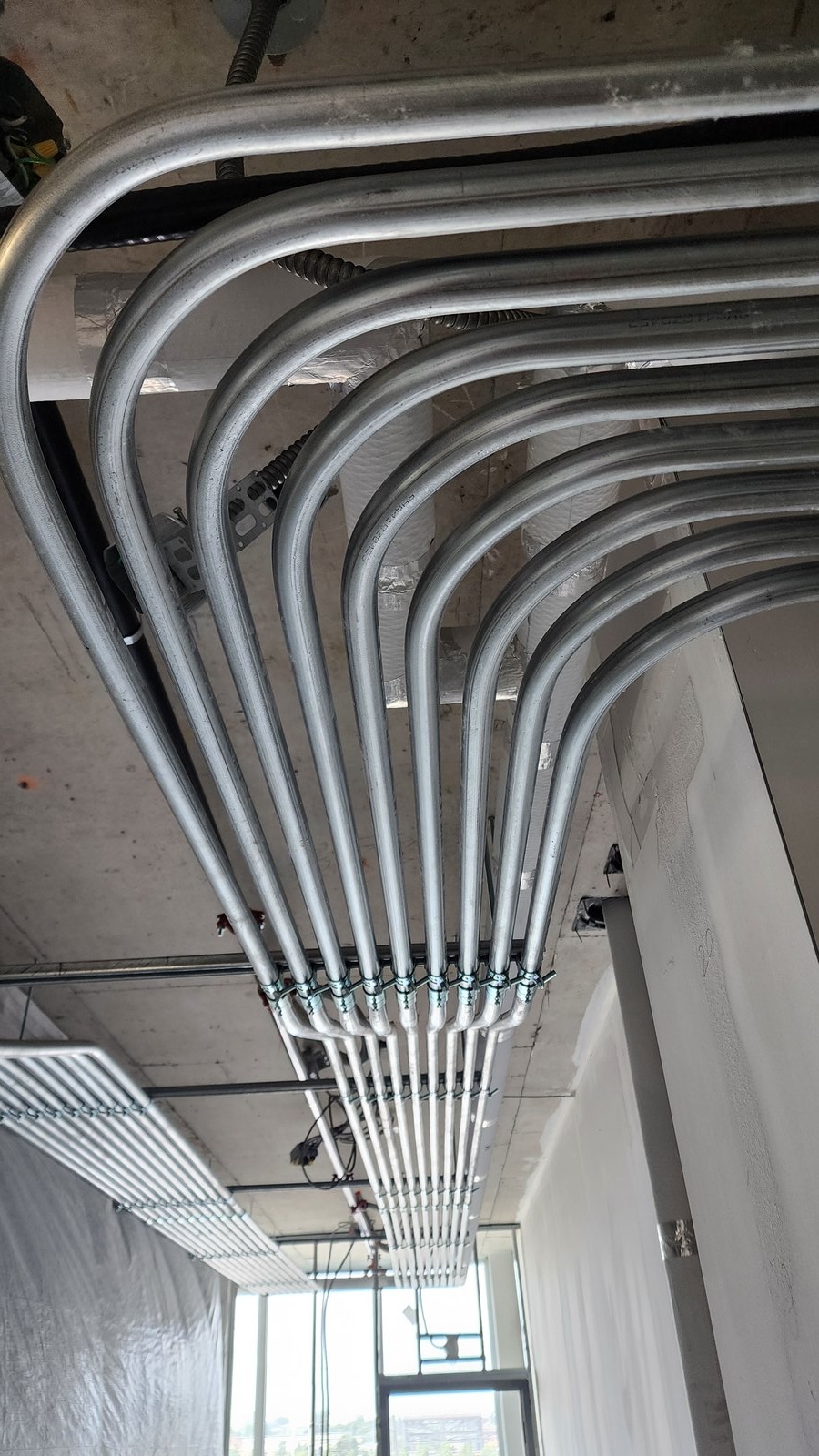 Completed EMT conduit pipe work on commercial project