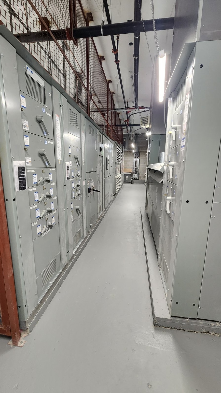 Completed commercial high-rise electrical room installation by Actus Electric in Toronto