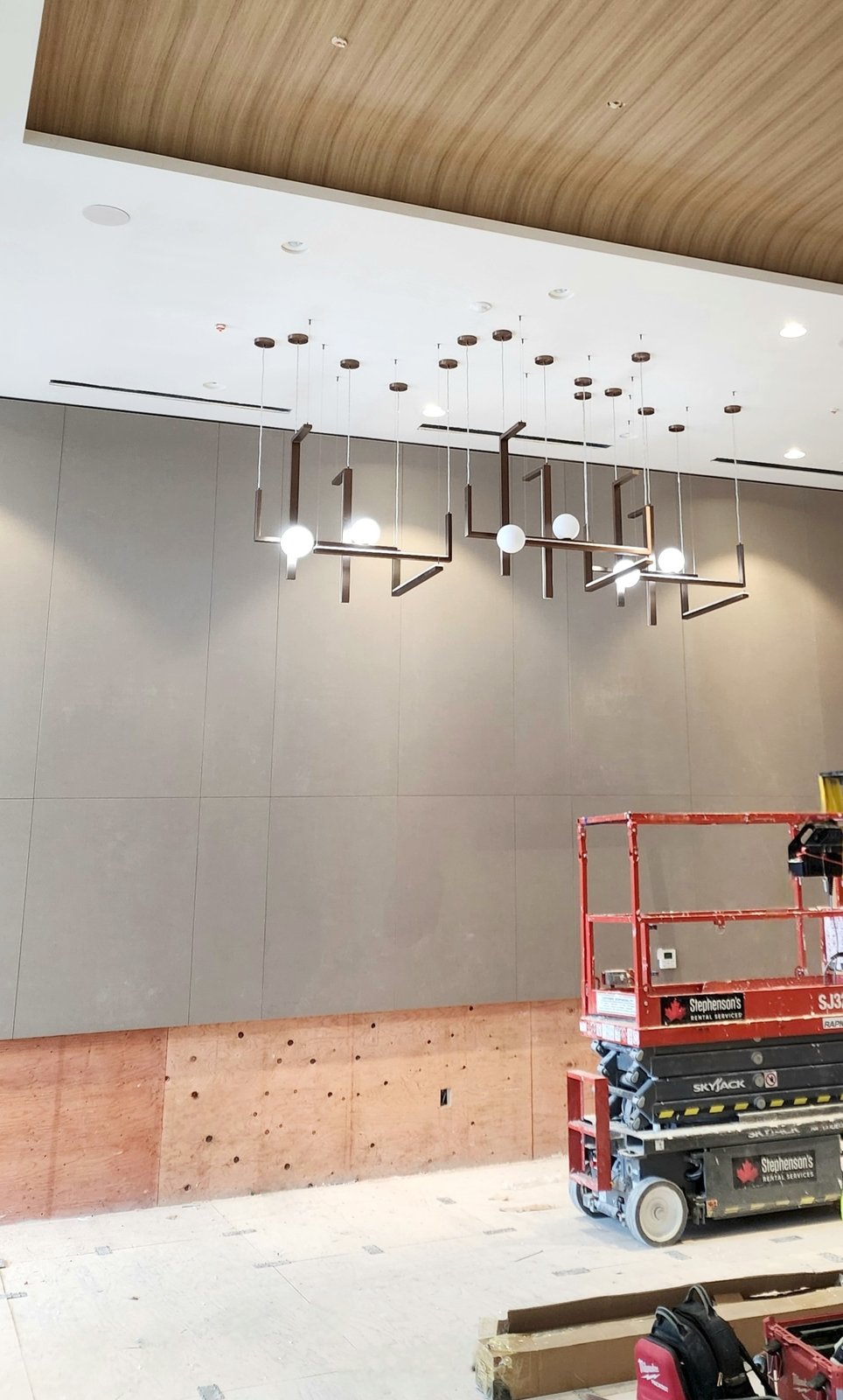 Common area lighting installation in a residential lobby by Actus Electric