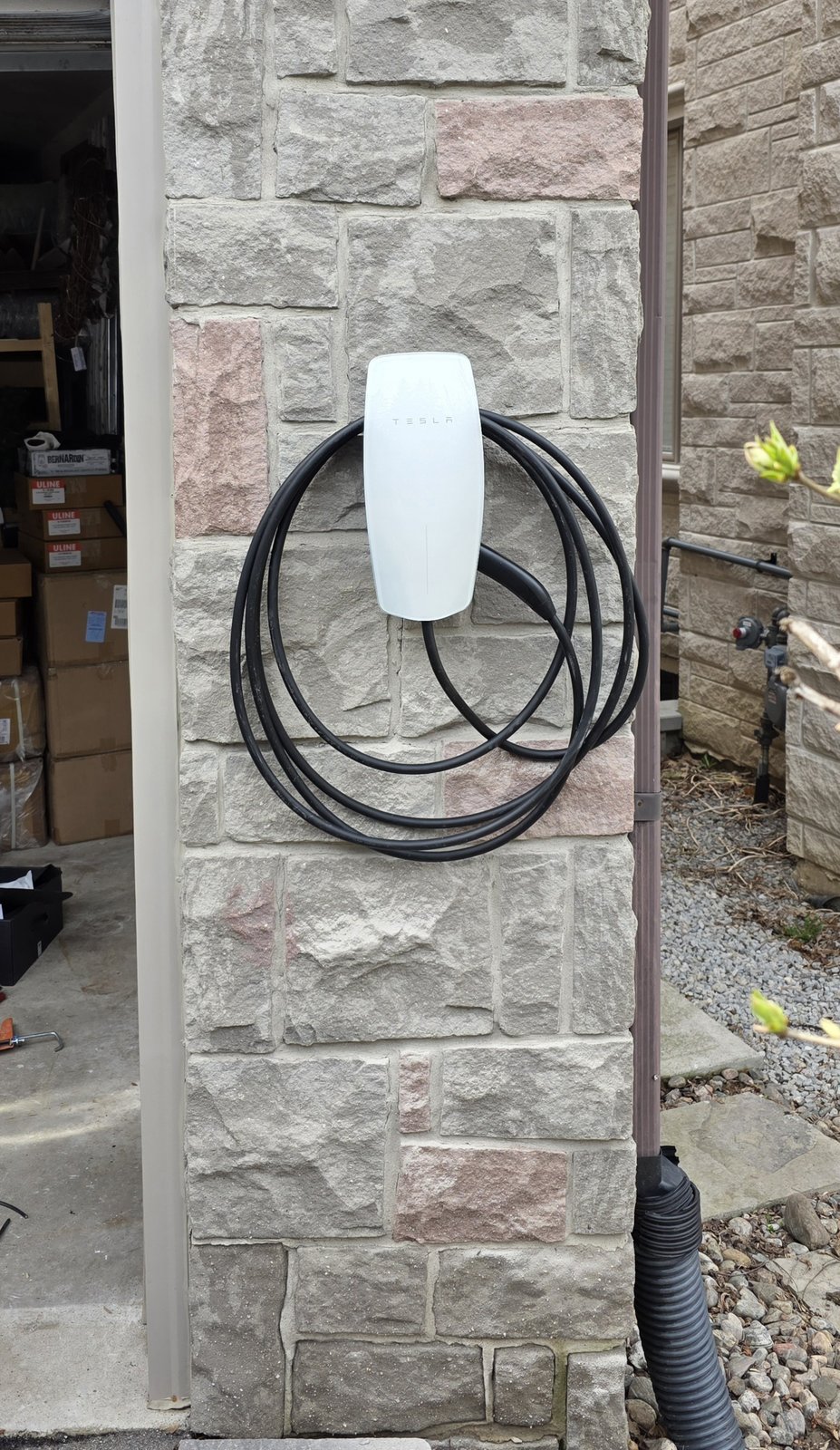 Outdoor EV charger installation by Actus Electric