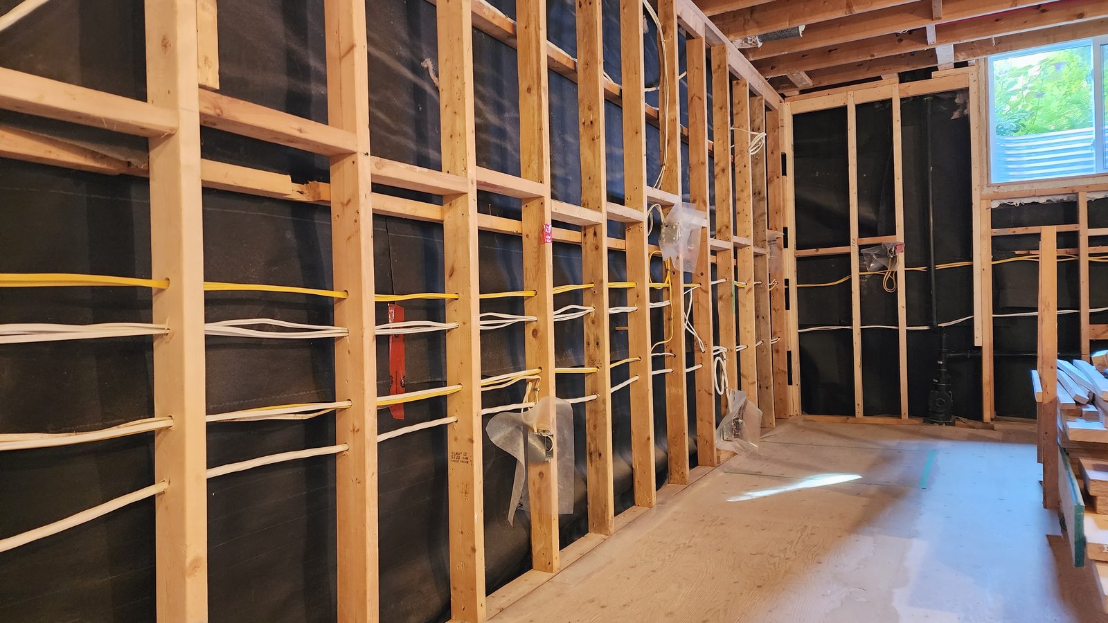 Residential legal basement wiring rough-in in progress